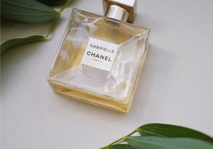 A pefume bottle laid down facing above